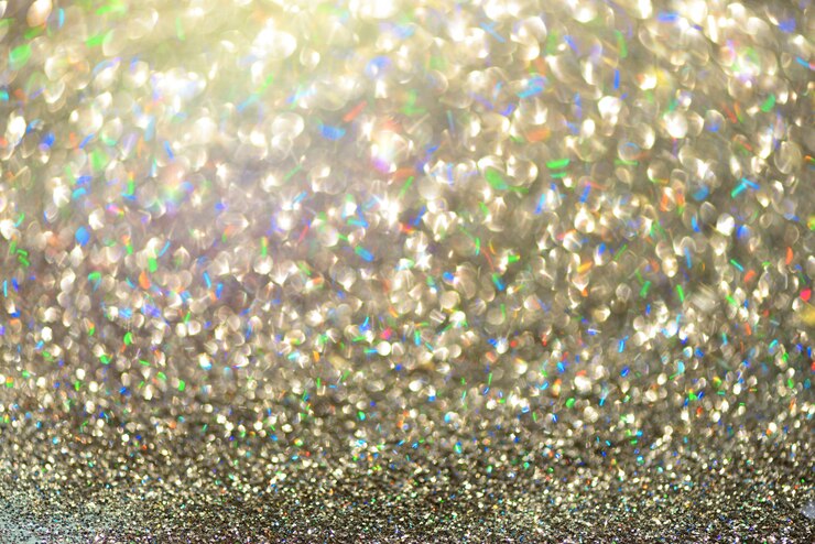 Foto gouden en zilveren abstracte bokehlichten.