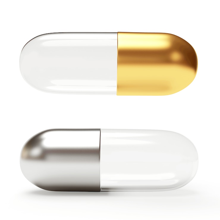 Foto gouden en zilveren transparante medische capsules