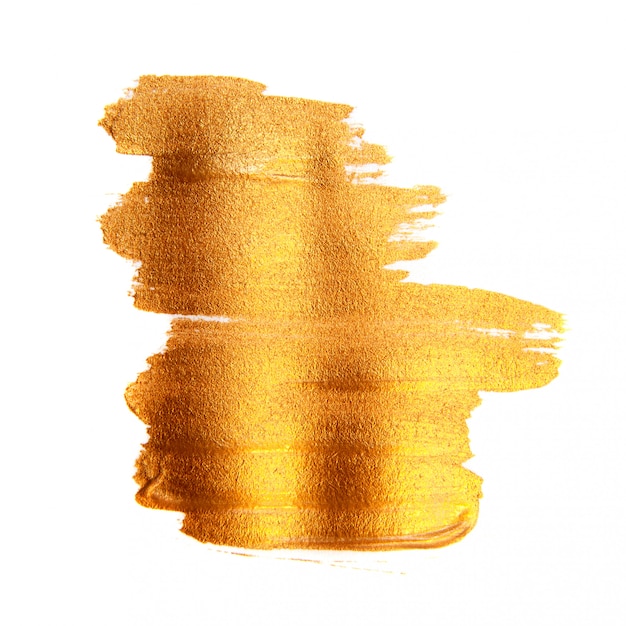 Foto gouden geschilderde borstel textuur achtergrond. glanzende gouden acrylvlek geïsoleerd