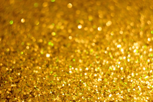 Gouden glitter Kerstmis glanzende abstracte overlay als achtergrond