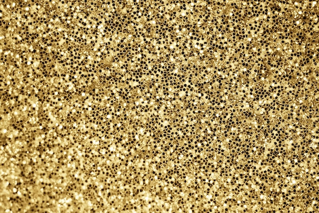 Foto gouden glitter sparkle textuur achtergrond