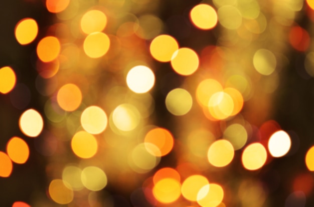 Gouden kerst wazig bokeh.