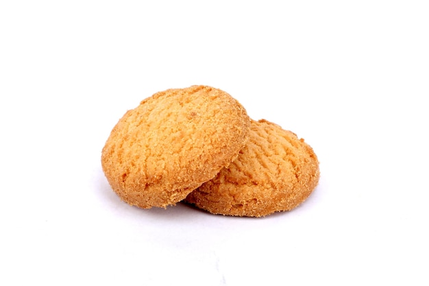 Gouden koekjes boterkoekjes op witte achtergrond