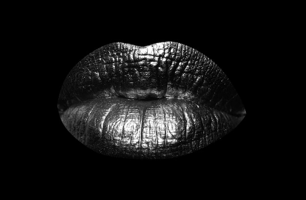 Foto gouden lippen gouden verf op mond gouden lippen op vrouw mond sensuele sexy lip geïsoleerd op zwart
