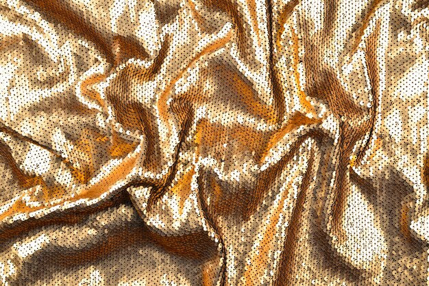 Gouden pailletten stof textuur.
