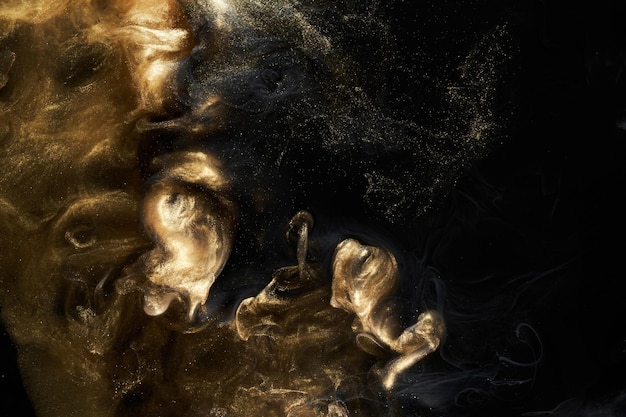 Gouden sprankelende abstracte achtergrond luxe zwarte rook acrylverf onderwater explosie kosmische wervelende inkt