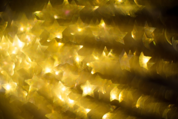 Gouden stervormige bokeh