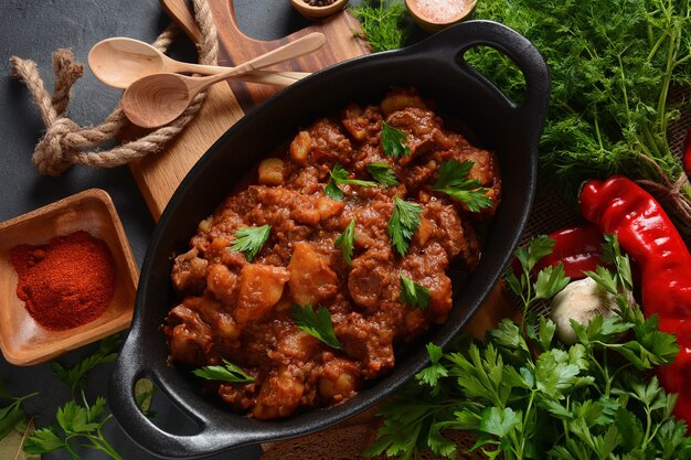 Goulash traditional Hungarian Beef Meat Stew or Soup with vegetables and tomato sauce