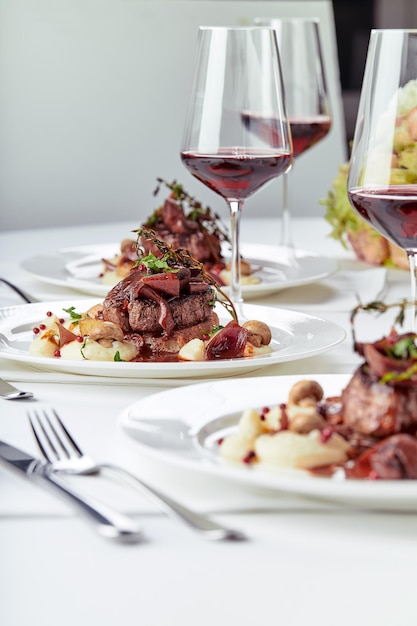 Gourmet appetizer: Beautifully decorated catering banquet foie gras with berries.