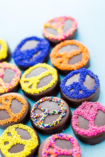 Gourmet Chocolate covered Oreos with colorful sprinkles on top.