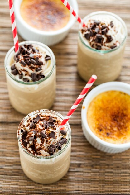 Gourmet cold cafe creme brulee chocolate drink garnished with dark chocolate.