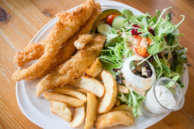 Gourmet fish and chips with salad