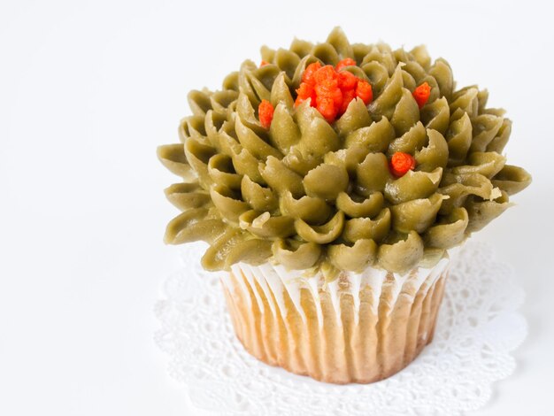 Gourmet green tea cupcake on white backround.