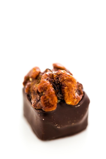 Gourmet maple walnut vegan truffle on a white background.