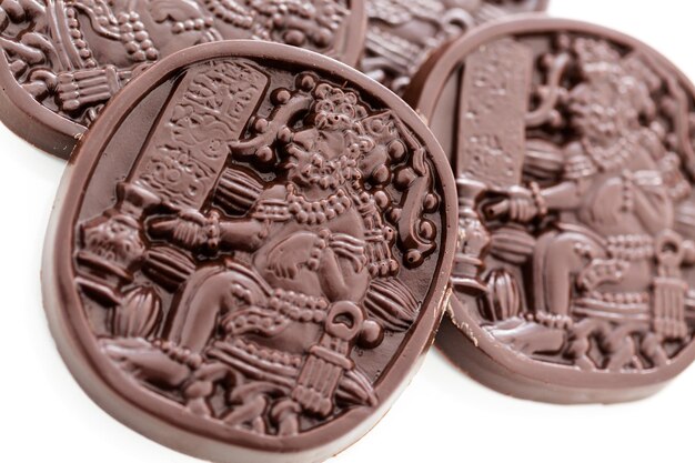 Gourmet Maya glyphs in dark chocolate.