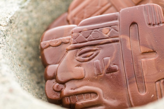 Gourmet Maya glyphs in milk chocolate.