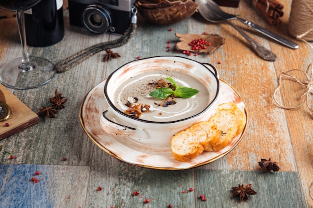 Gourmet mushroom cream soup with croutons