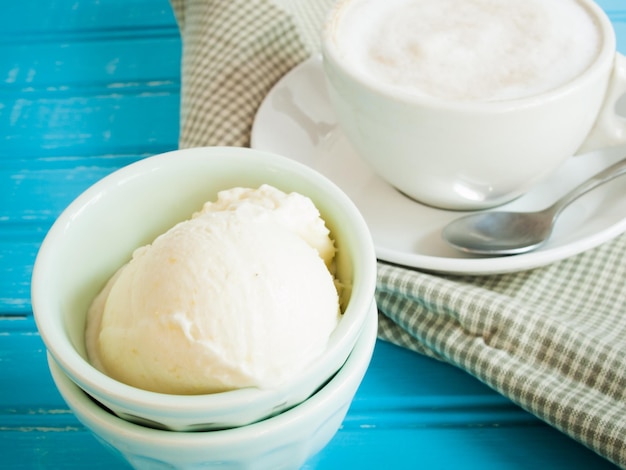 Gourmet Olathe sweet corn gelato on blue background.