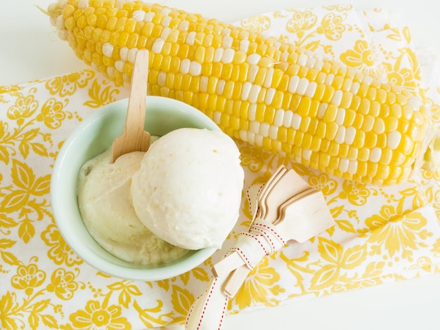 Gourmet Olathe sweet corn gelato on white background.