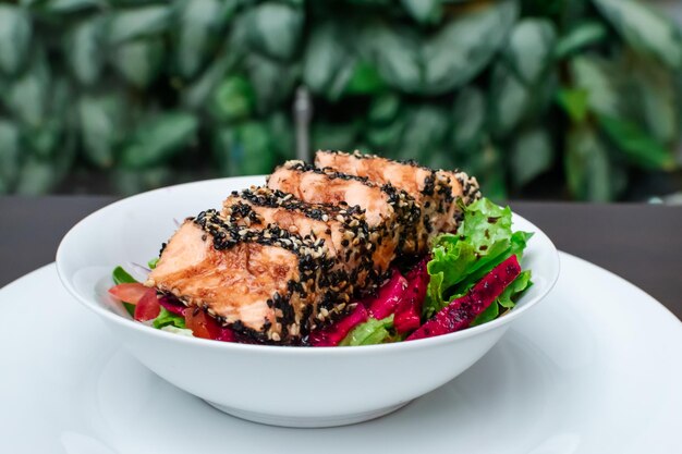 Gourmet spiced salmon salad dish