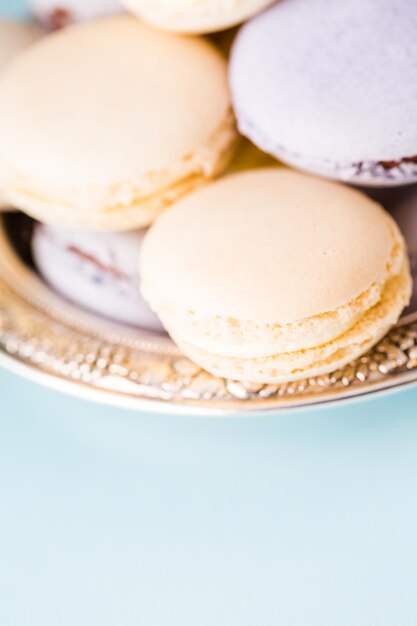 Gourmet Spring macarons on silver platter.