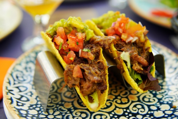 Gourmet steak tacos served on the restaurant terrace