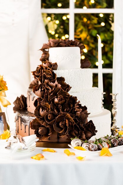 Gourmet tiered wedding cake at wedding reception.