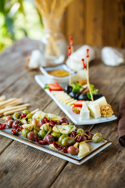 Gourmet wine appetizers cheese and olives