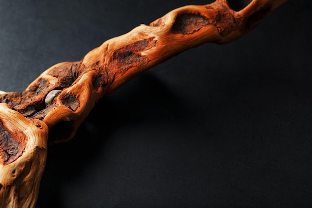 Graceful curved wood Driftwood on a black background