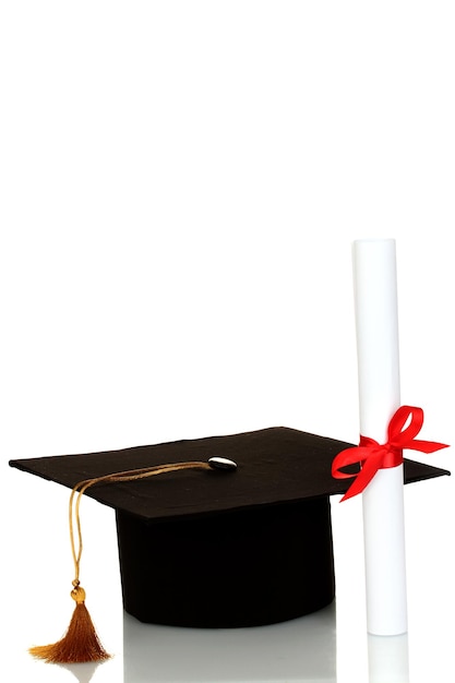 Grad hat and diploma isolated on white