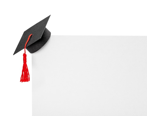 Graduate hat on the corner of paper banner. Mock-up isolated on white background.