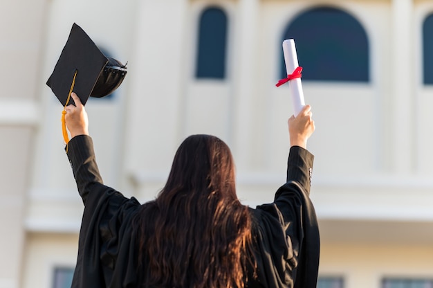 Graduates wear a black hat to stand for congratulations on graduation	