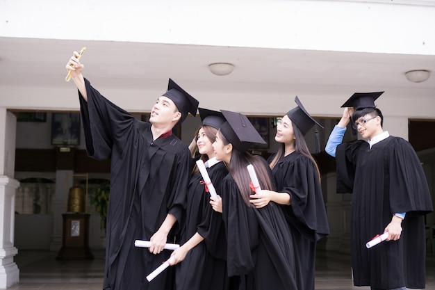 graduating outdoors high bachelor education diploma