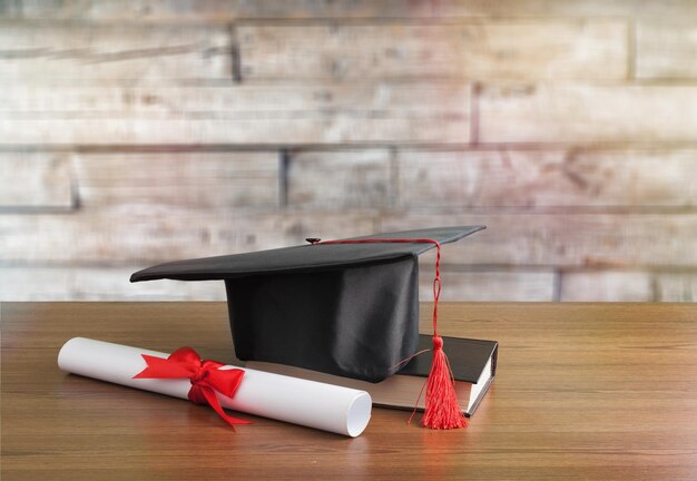 Graduation black hat on desk