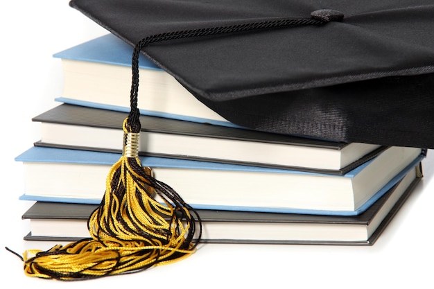 Graduation cap and books