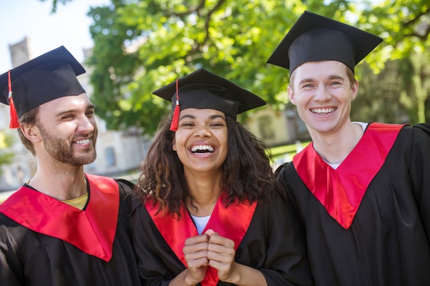 Graduation. a group of graduates looking happy and excited