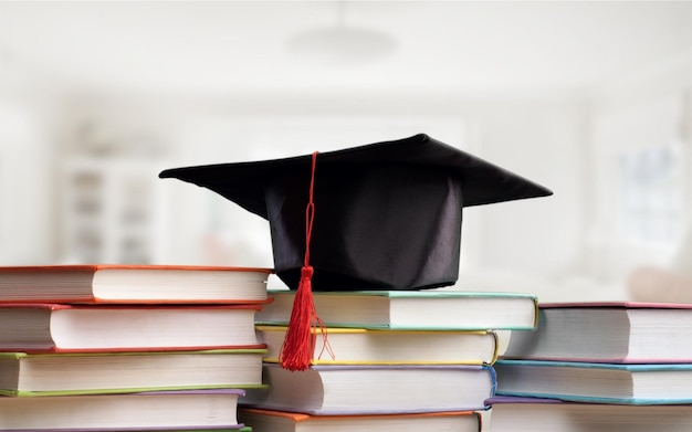 Cappello di laurea stetoscopio medico, libro