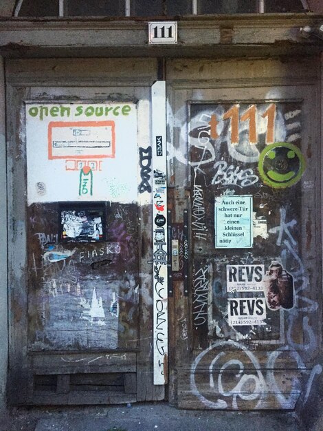 Photo graffiti on old house door