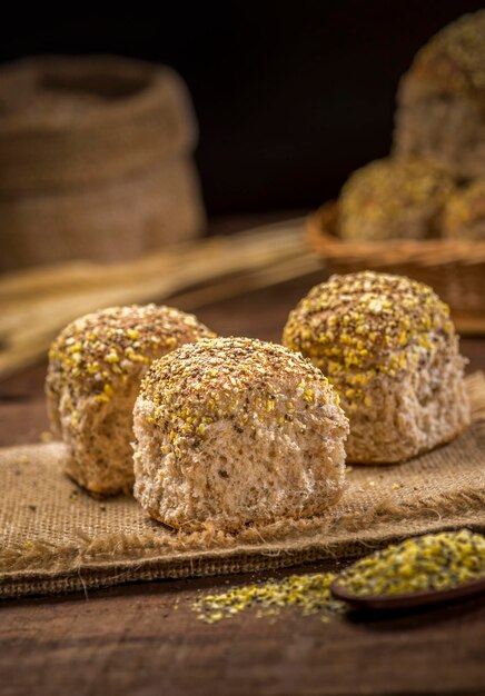 Grain bread on rustic wooden table.