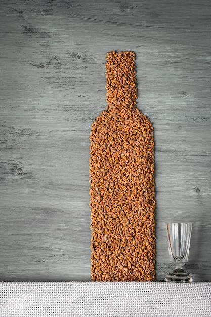 Grains and alcohol bottle