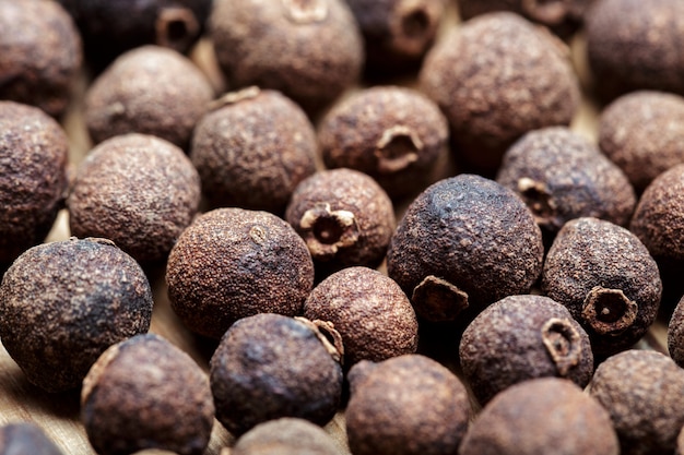 Grains of black pepper background. Black pepper peas