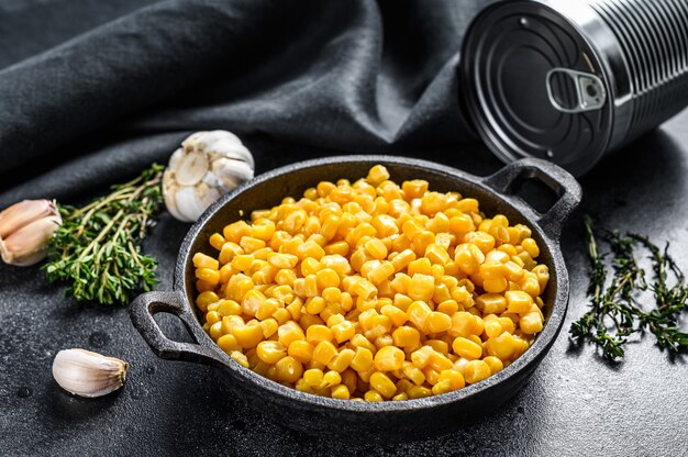 Grains of sweet canned corn in a pan
