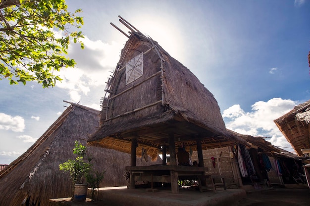 Photo the granary at traditional sade village lombok low angle view of traditional building against sky