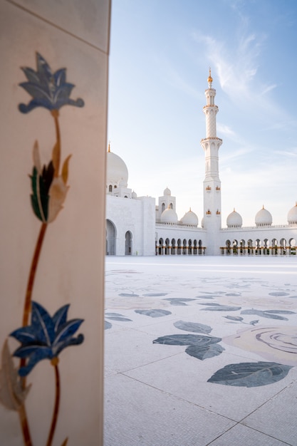 Grand Mosque in Abu Dhabi in the evening during sunset. Panorama of exterior of Sheikh Zayed Mosquein UAE.