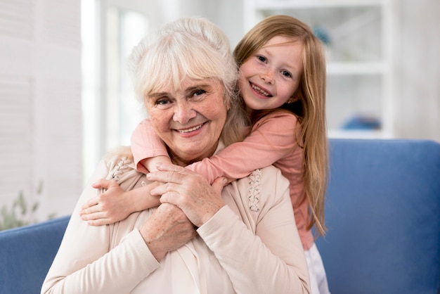 Grandma and girl hugging