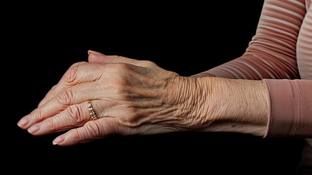 Grandmother39s hand clutching her wrist in pain