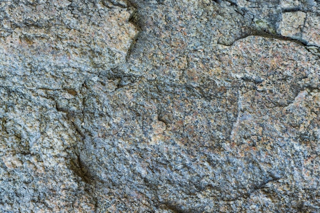Graniet textuur. Natuurlijke rotstextuur. Abstracte stenen achtergrond. aarde kleuren