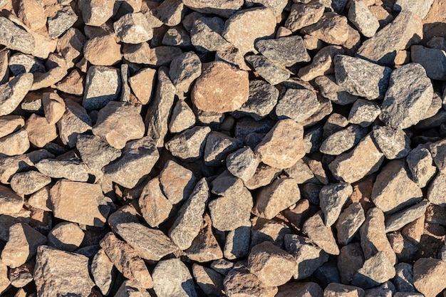 Granite crushed stone or graphy. Building material texture background.