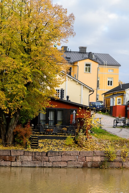 The granite embankment with red houses and barns