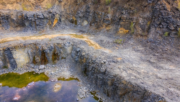 Granite quarry with a gray grade of a stone.